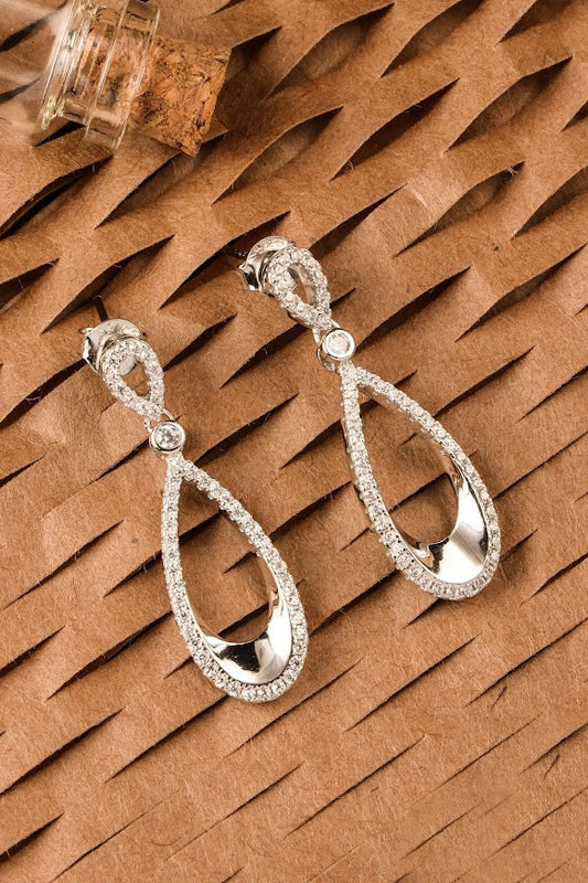 Silver intrecate tear drop earrings